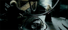 Draco disarms dumbledore.gif