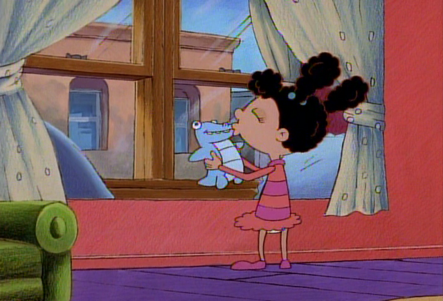 File:Kissing her doll.png
