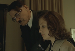Hitler checks Traudl's writing