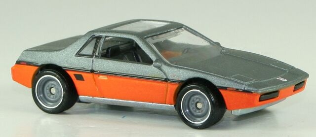 File:HWB13-84PontiacFiero-SilverOrange.jpg