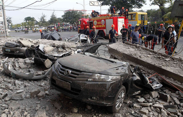 File:Crushed cars in Cavite.jpg