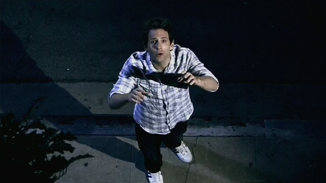 File:5x10 Dennis at window.png