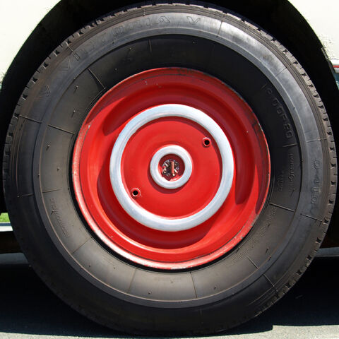 File:Red bus wheel.jpg