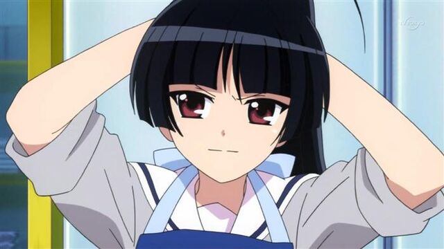 File:Kanon making up her hair.jpg