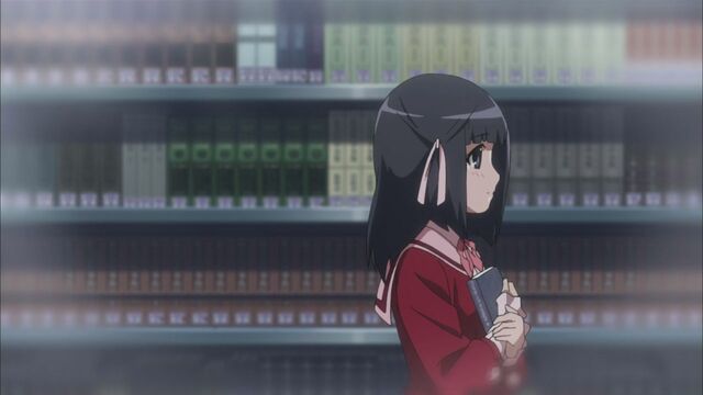 File:Shiori spend time with her books.jpg