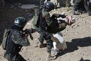 Al Kadhum arresting citizens