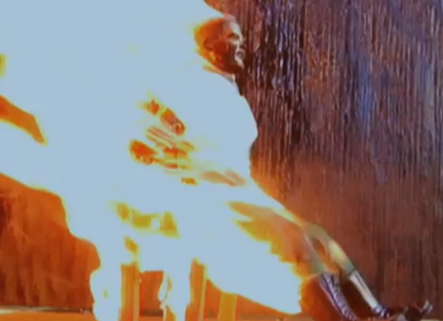 File:Captain Action burning.png