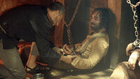 6x09 OutOfTheChains.jpg