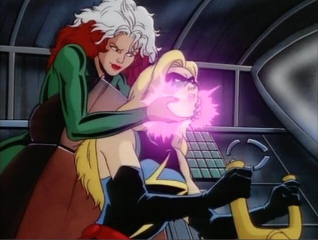File:Rogue Grabs Ms Marvel.jpg