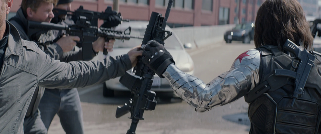 File:Bucky taking a gun.png