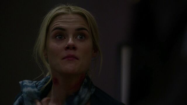 File:TrishWalker-ShowsNeckWound.jpg