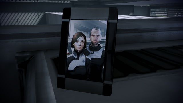 File:ME3 Bryson family photo.png