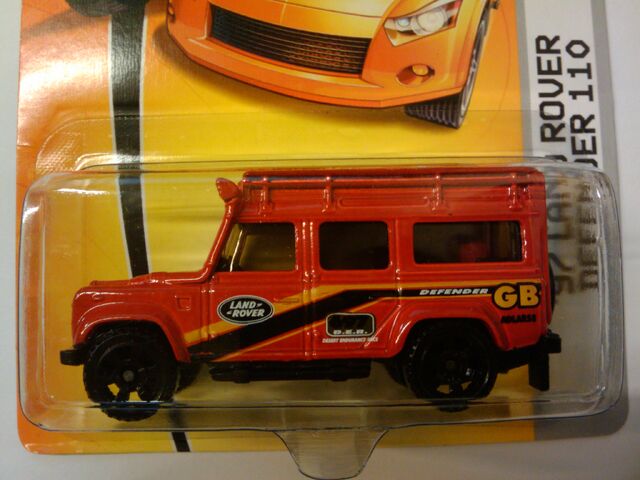 File:Land rover defender red.jpg