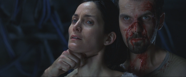 File:Bane holding Trinity.png