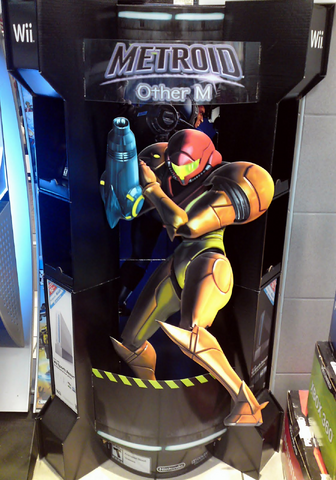 File:MOM standee.png