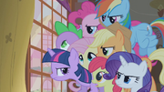 Everyone presses closer to the window S1E09.png