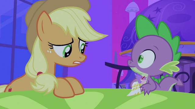 File:Applejack seeing Spike holding Cadance figurine S2E25.png