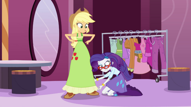 File:Rarity begins to shorten Applejack's dress EG.png