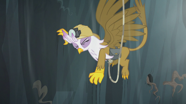 File:Gilda grabs onto the rock wall with her claws S5E8.png