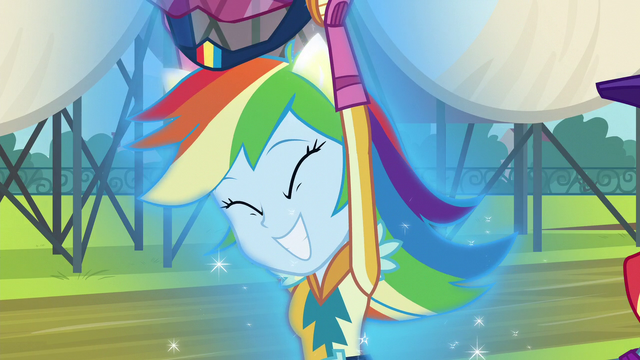 File:Rainbow removes her helmet and sprouts pony ears EG3.png