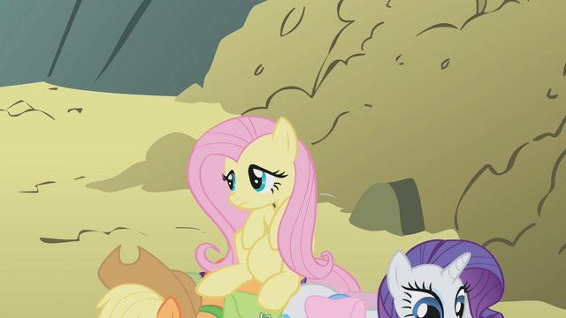 File:Fluttershy sitting on Applejack and Rarity S1E07.png