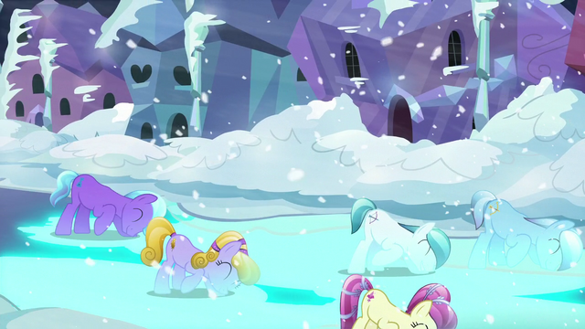 File:The Crystal Ponies bowing and making the streets glow blue S6E2.png