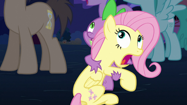File:Spike holds Fluttershy S3E05.png