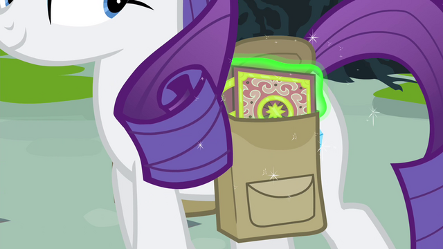File:Rarity keeping the book in her saddlebag S4E23.png