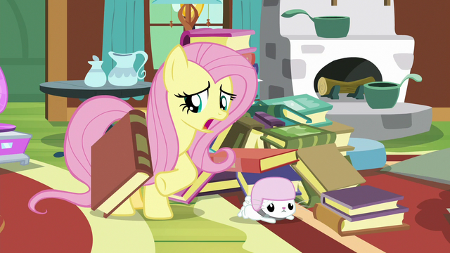 File:Fluttershy unburies Angel from book pile S7E5.png