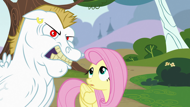 File:Fluttershy looking at Bulk Biceps S4E10.png