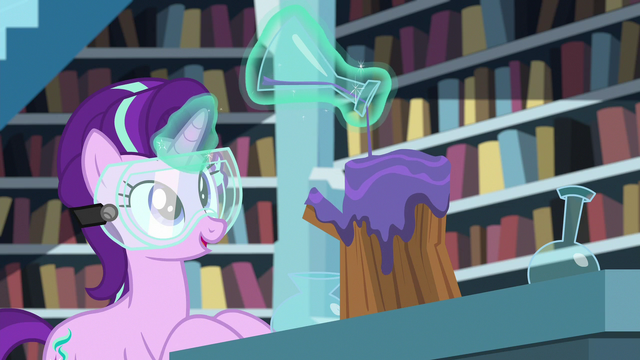 File:Starlight pouring potion on piece of wood S7E1.png