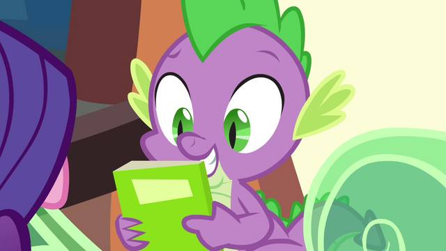 File:Spike holding new comic S4E22.png