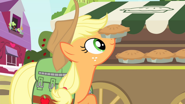 File:Applejack putting pies S4E17.png