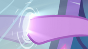 Twilight putting her hoof into the mirror EG