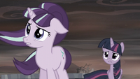 Starlight looks out toward the barren landscape S5E26