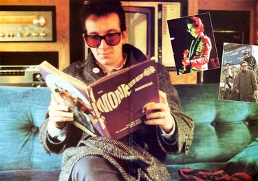 Elvis Cost reading Monkee