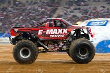 14639022-BARCELONA-SPAIN-NOVEMBER-12-Frank-Krmel-driving-the-E-Maxx-Monster-Truck-during-a-Monster-Jam-specta-Stock-Photo