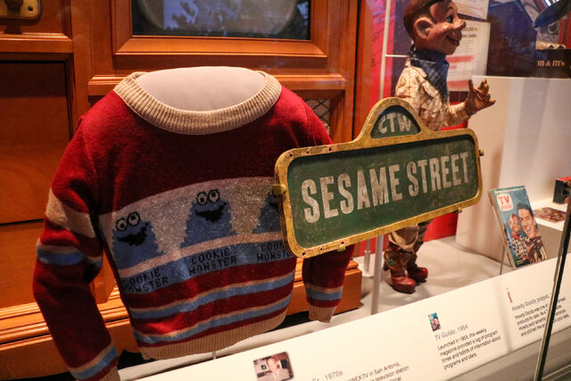 File:Smithsonian sweater and sign.jpg