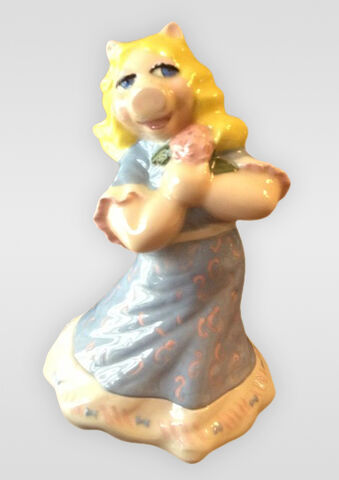 File:Porcelain-Piggy-holding-flower.jpg