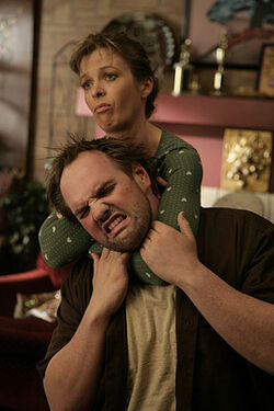 Karen wrestles with Randy