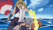 Ginkaku dan kinkau memegang alat berharga.png