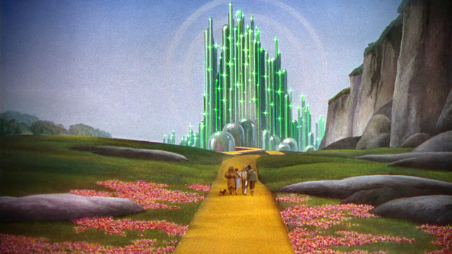 Fichier:Le Magicien d'Oz (film) 1939 route de briques jaunes Palais Cité d'Émeraude Toto lion Dorothée Dorothy Gale homme bûcheron en fer blanc épouvantail.png