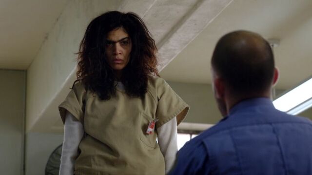 File:S04E09 Flores on table.jpg