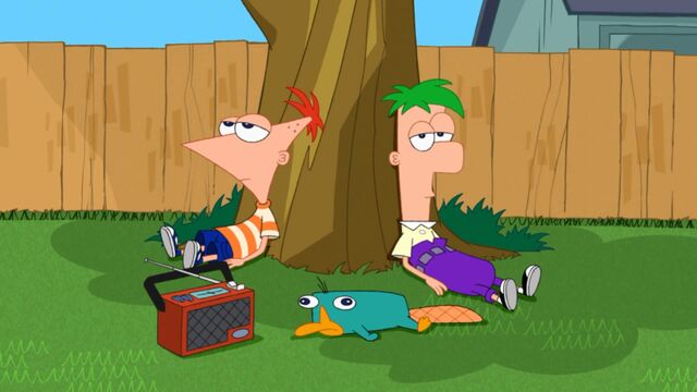 File:Boys relaxing under tree.jpg