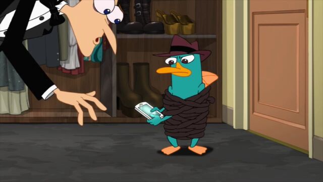 File:Perry texting.jpg