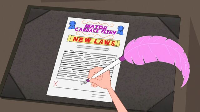 File:Mayor Candace signing new laws.jpg