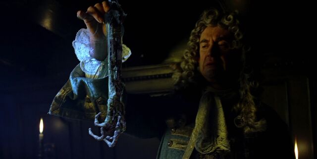 File:CotBPGovernorSwannholdingSkeletonhand.jpg