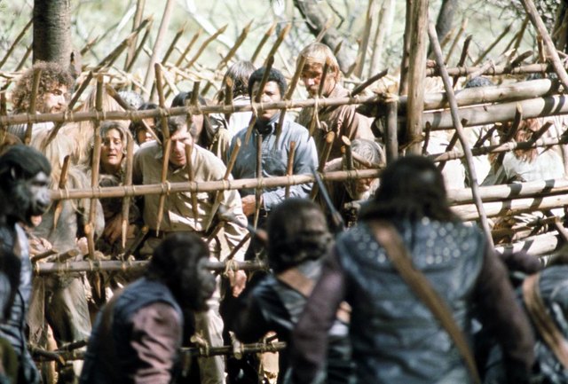 File:CagedHumans.png