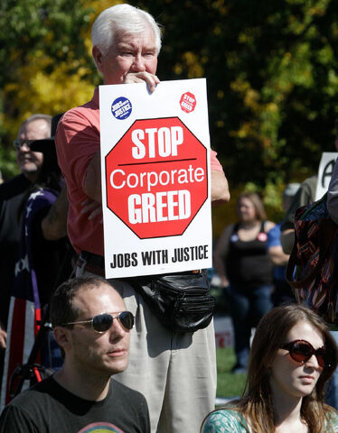 File:Sign- stop greed1.jpg