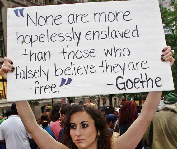 File:Sign- hopelessly enslaved.jpg